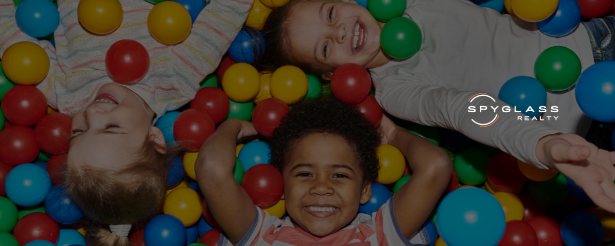 kids playing in a ballpit